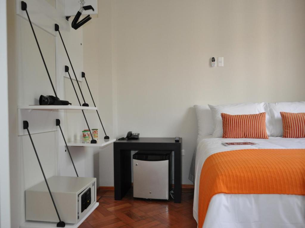 Postel nebo postele na pokoji v ubytování Hotel CasaDeTodos