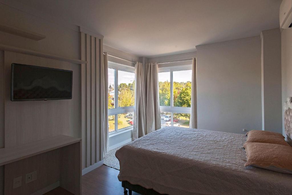  AMPLO APARTAMENTO JUNTO À RUA COBERTA DE CANELA - Campos de Canella