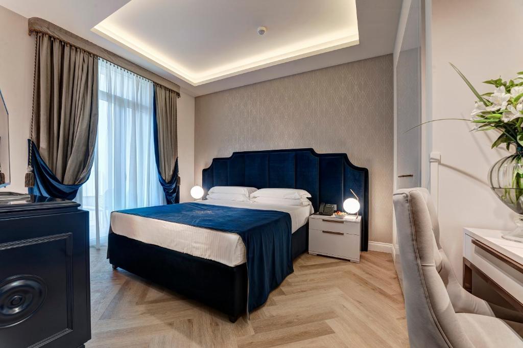 Postel nebo postele na pokoji v ubytování Hotel Premiere Abano