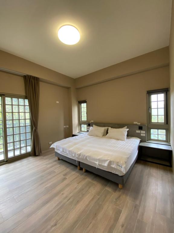 Postel nebo postele na pokoji v ubytování Sitou ARCADIA Homestay