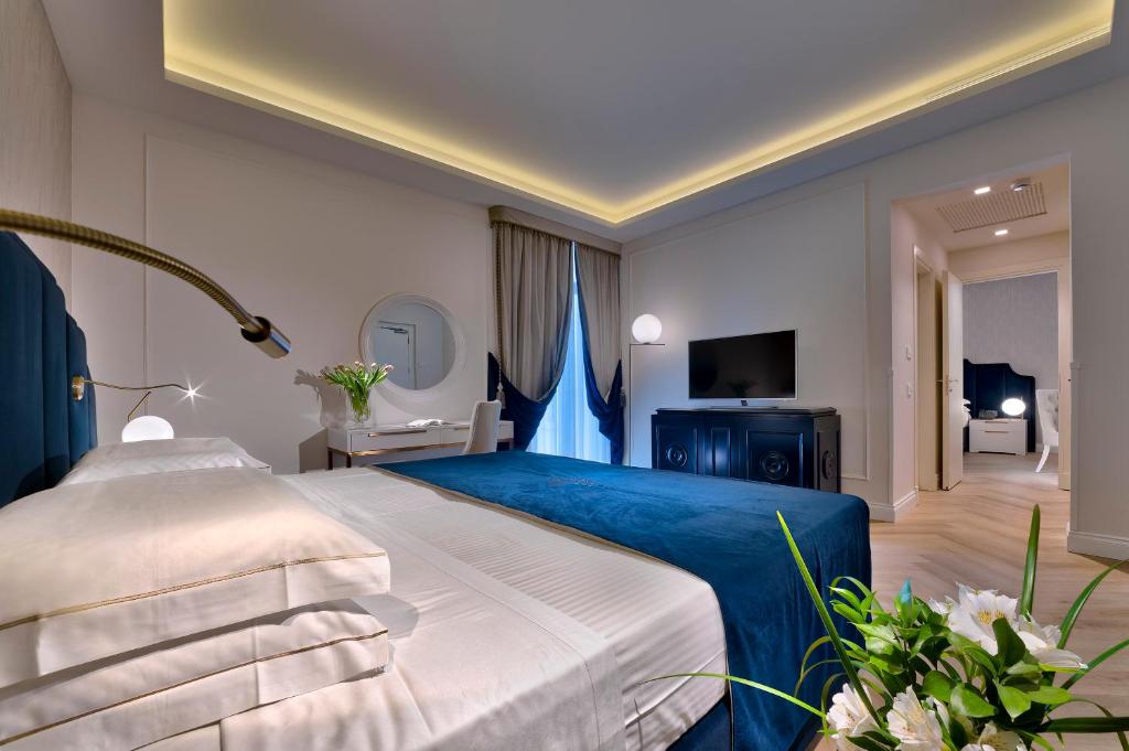 Postel nebo postele na pokoji v ubytování Hotel Premiere Abano