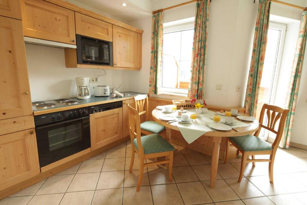 Kuchyň nebo kuchyňský kout v ubytování Aparthotel Alpenpark