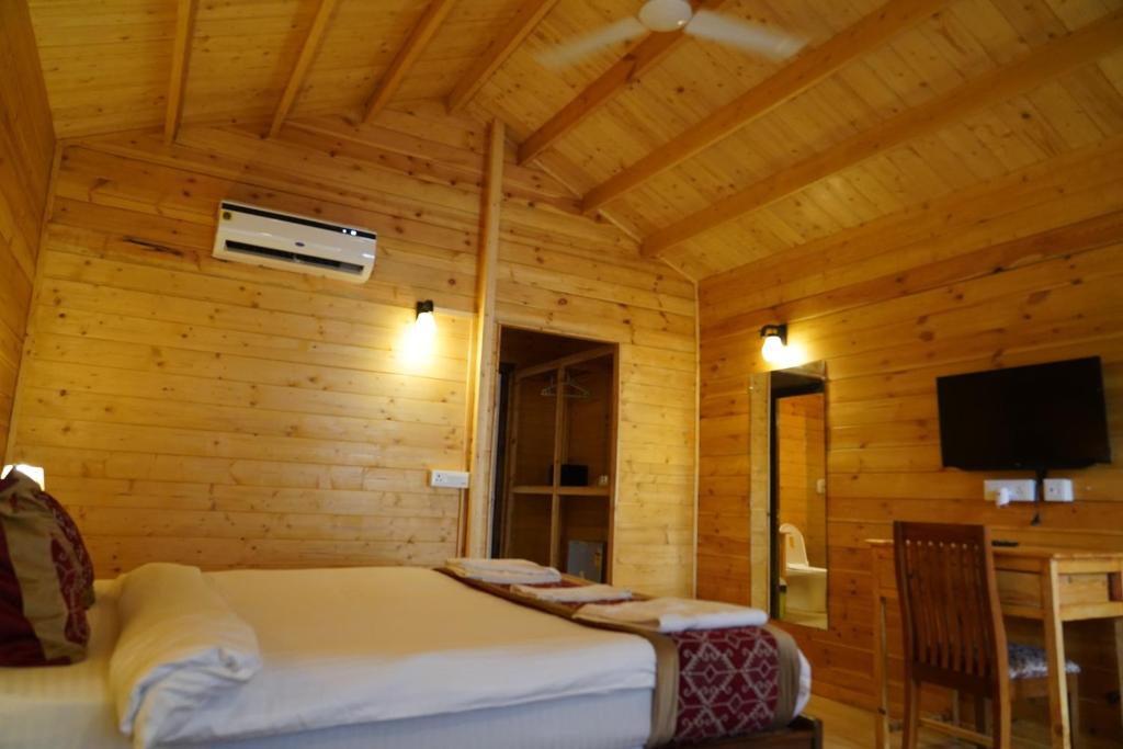 TV a/nebo společenská místnost v ubytování Golden Sands Resort, Morjim