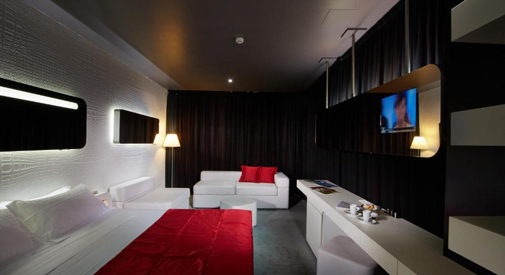 Postel nebo postele na pokoji v ubytování San Ranieri Hotel