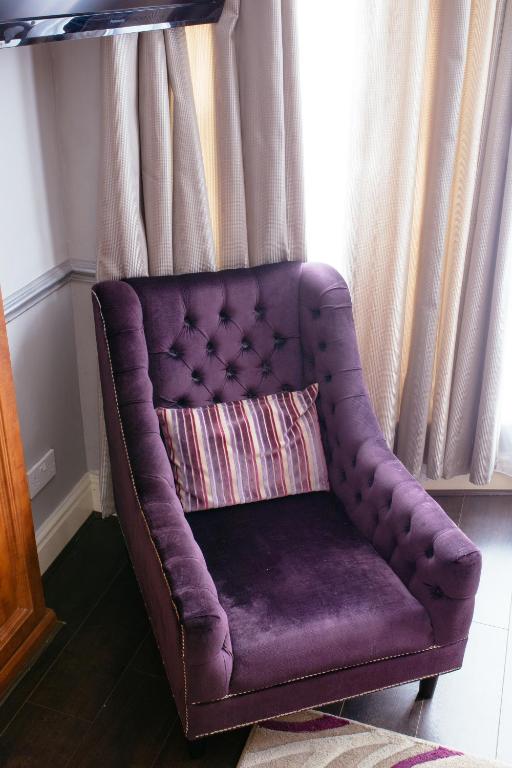 Posezení v ubytování Pymgate Lodge Hotel Manchester Airport