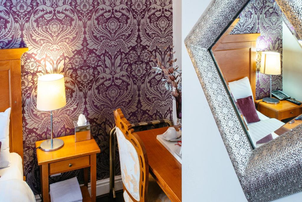 Postel nebo postele na pokoji v ubytování Pymgate Lodge Hotel Manchester Airport