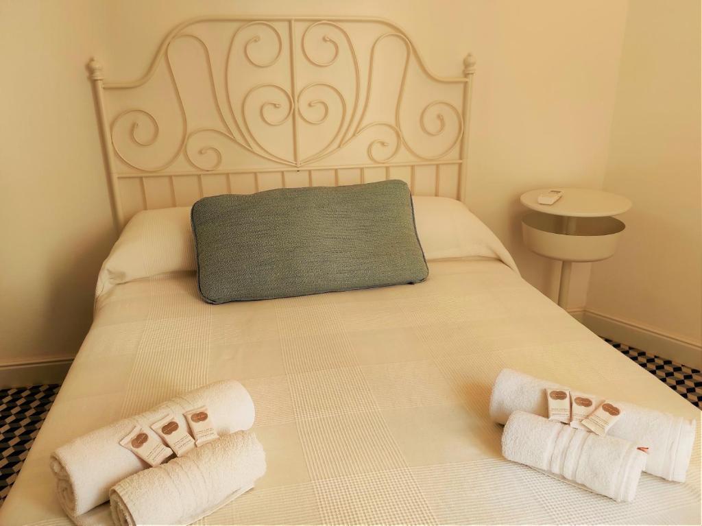 Posteľ alebo postele v izbe v ubytovaní Suite Bagnara- Ortigia Holidays