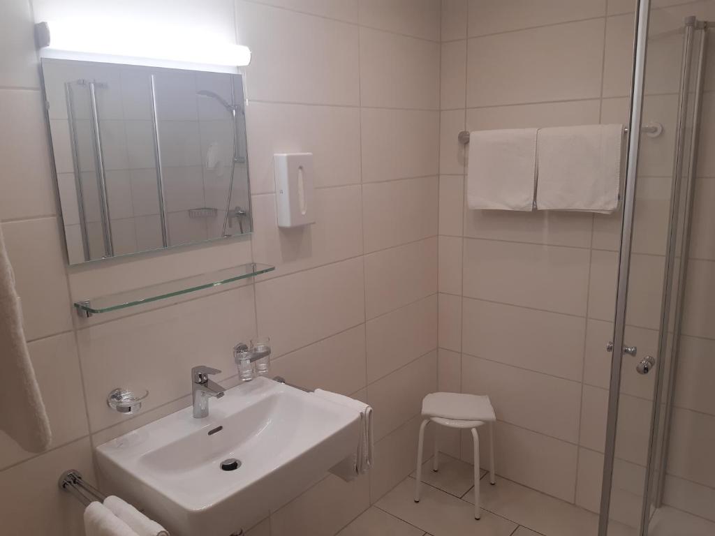 Kúpeľňa v ubytovaní Landhaus Klausnerhof Hotel Garni