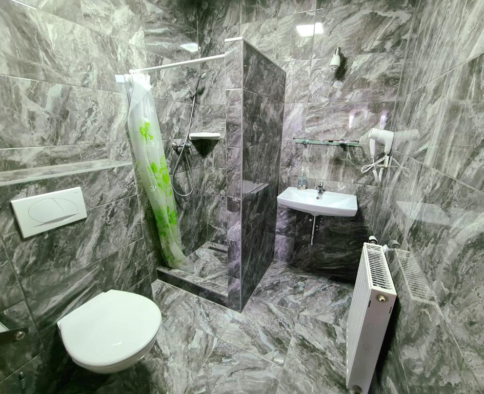 Kúpeľňa v ubytovaní Regina Apartman Hegykő