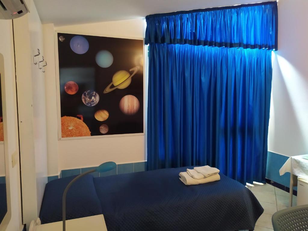 Postel nebo postele na pokoji v ubytování B&B Luna Blu