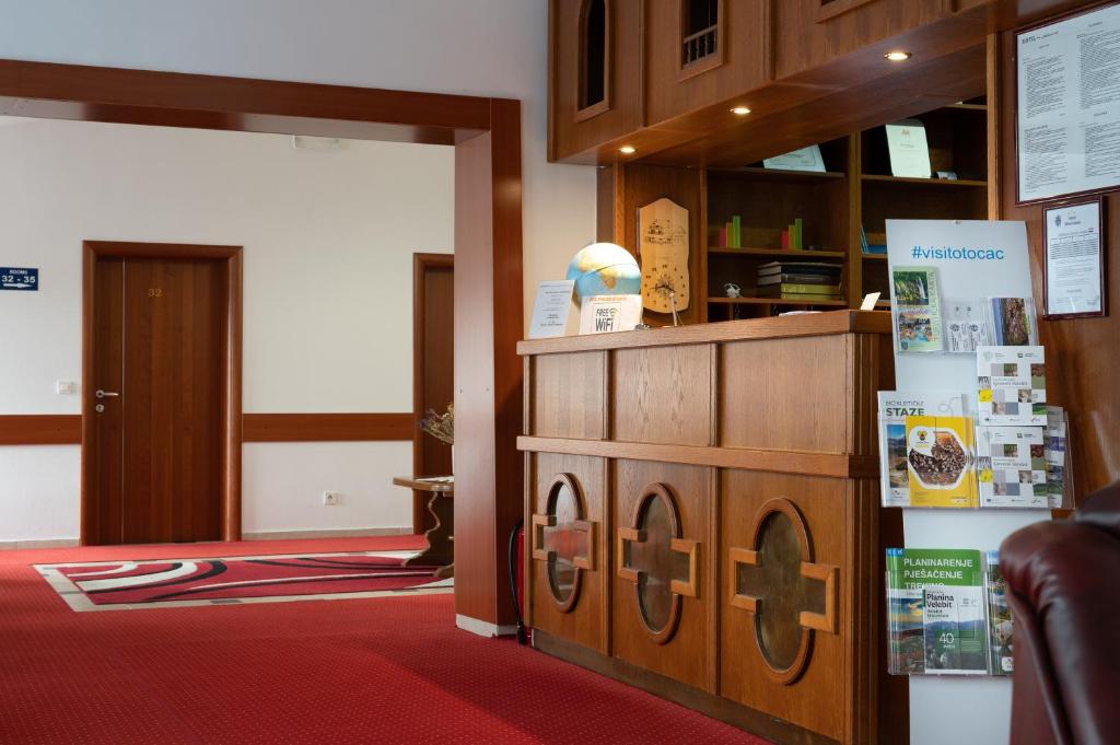 Postel nebo postele na pokoji v ubytování Hotel Mirni Kutak