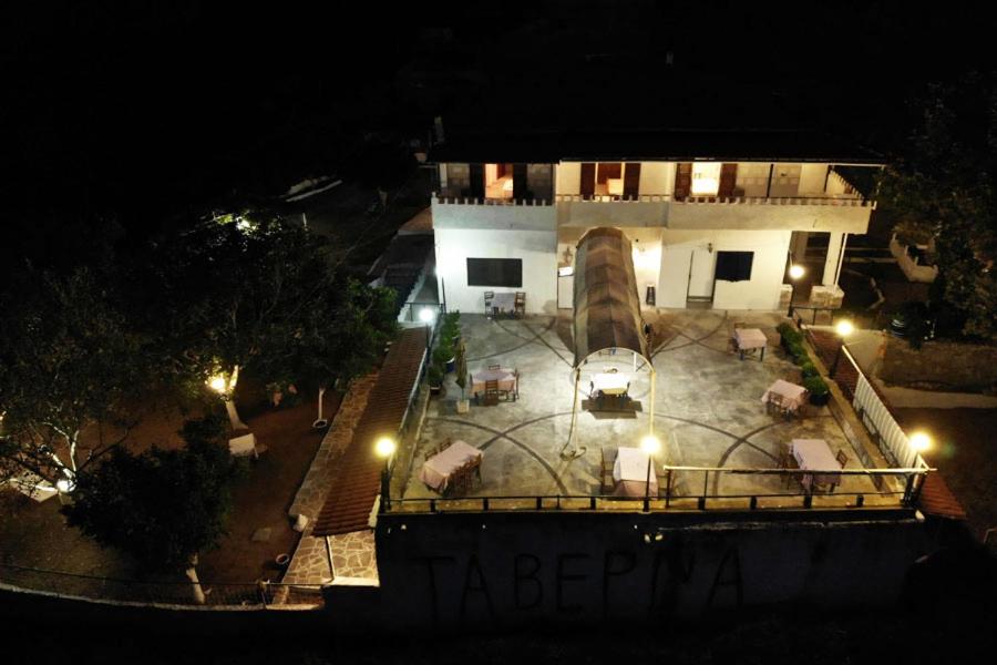 an aerial view of a building at night at Rizos Veranda - Rooms in Isómata