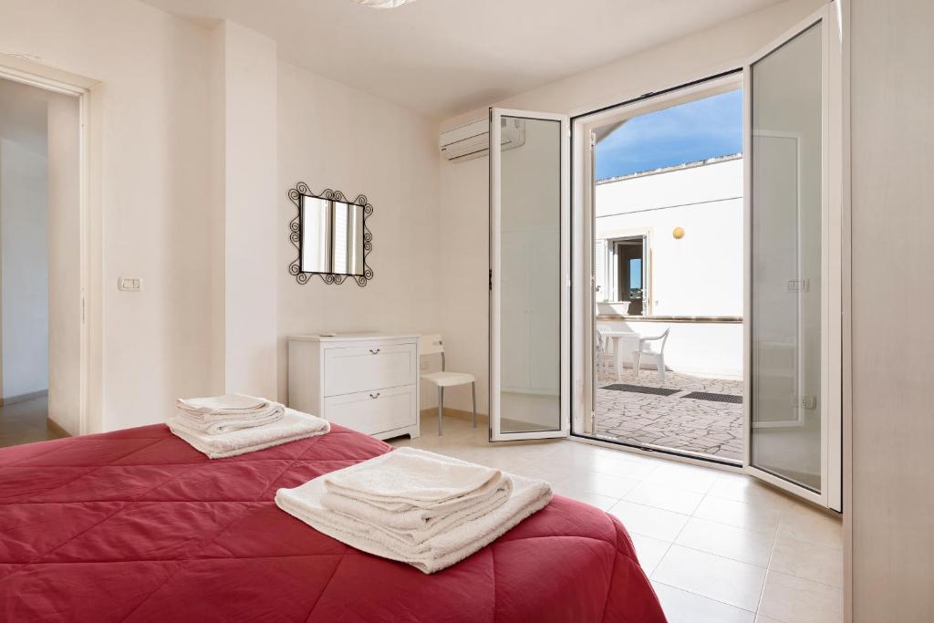 Posteľ alebo postele v izbe v ubytovaní Residence Bellevue