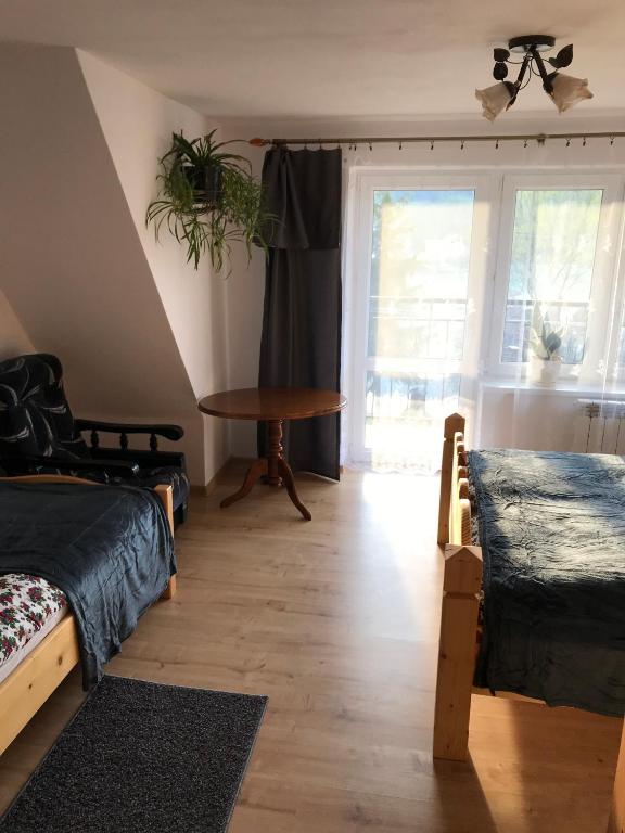 Voodi või voodid majutusasutuse Apartament i pokoje u Piotra toas