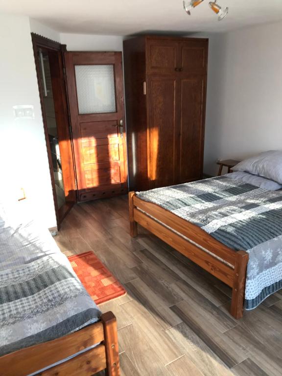 Voodi või voodid majutusasutuse Apartament i pokoje u Piotra toas