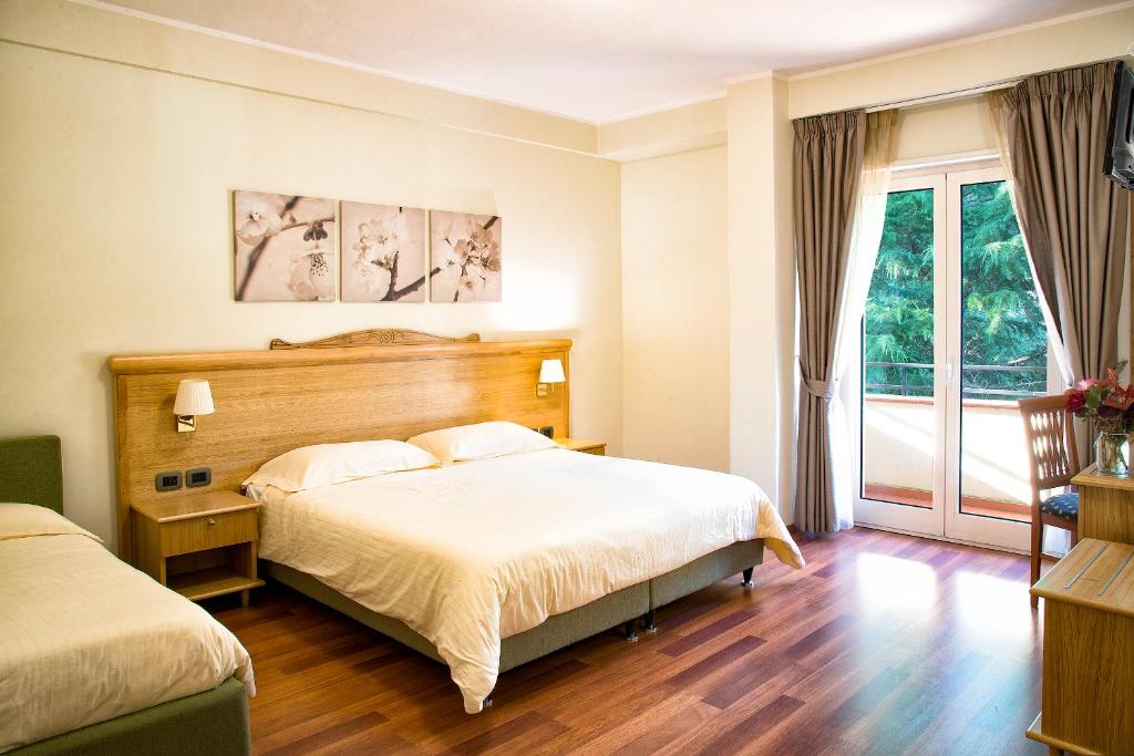 Postel nebo postele na pokoji v ubytování Hotel Park 108 Sport&Wellness