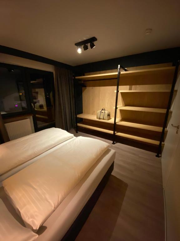 Posteľ alebo postele v izbe v ubytovaní Dahoam by Sarina - Village Appartements