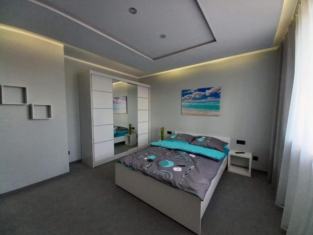 Posteľ alebo postele v izbe v ubytovaní Apartament U Bosmana
