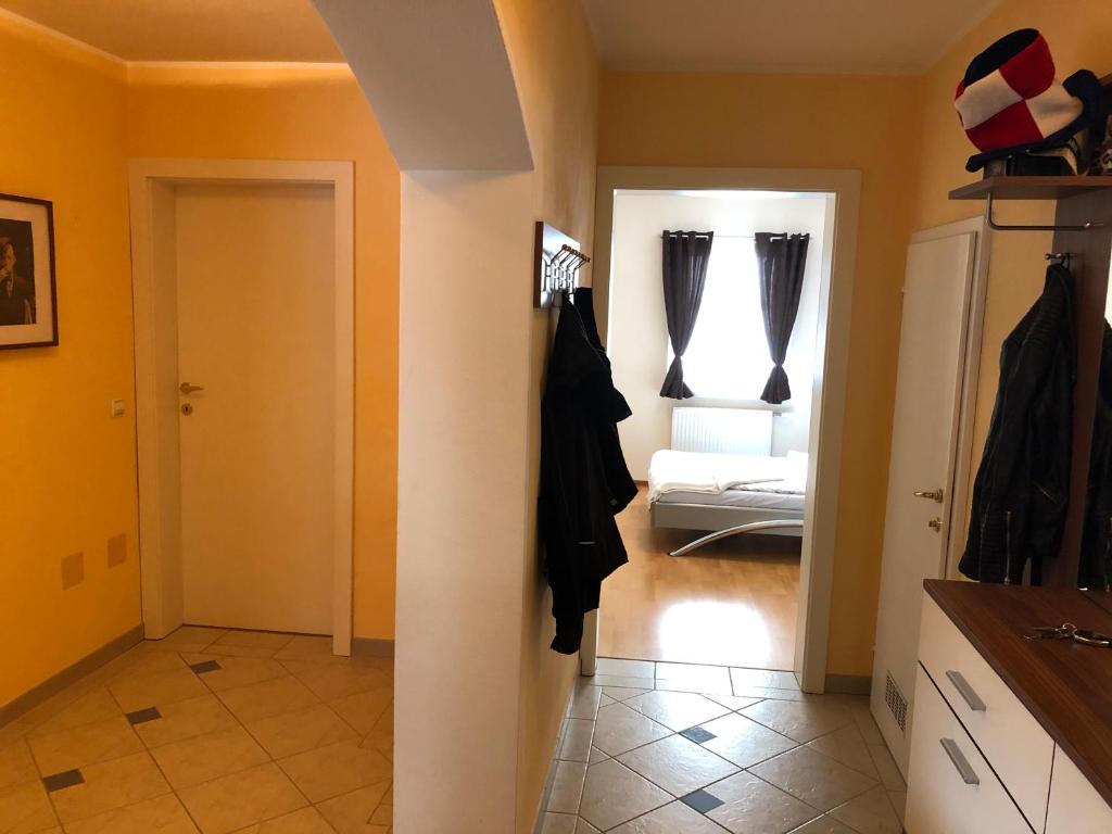 Postel nebo postele na pokoji v ubytování Ferienwohnung Stiftsgartenblick