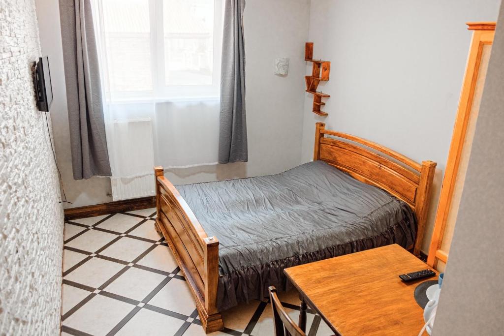 Postel nebo postele na pokoji v ubytování SAMARIANKA hotel