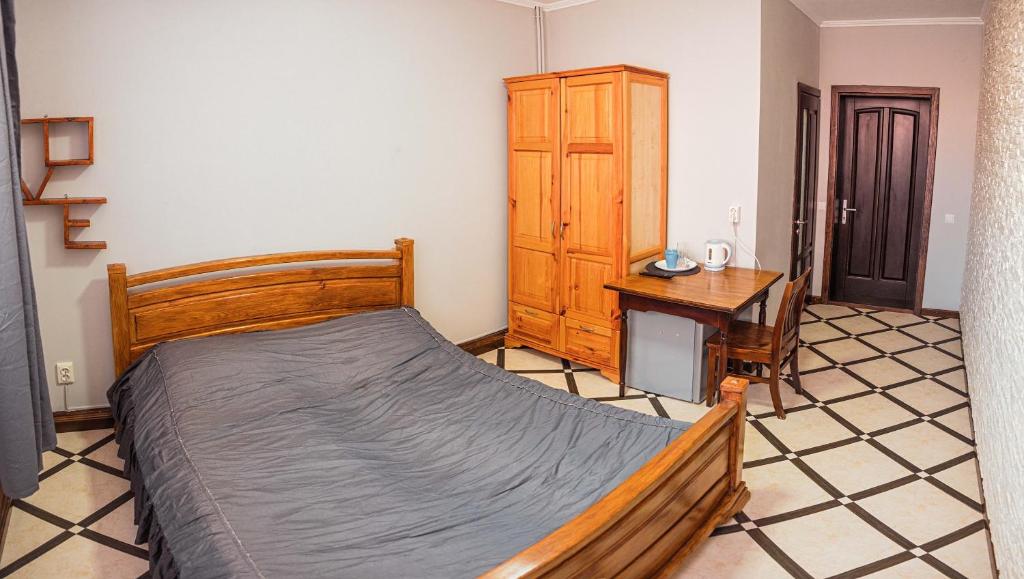 Postel nebo postele na pokoji v ubytování SAMARIANKA hotel