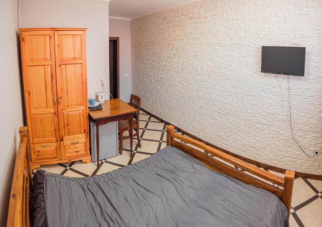 Postel nebo postele na pokoji v ubytování SAMARIANKA hotel