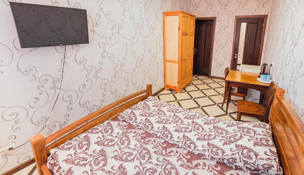 TV a/nebo společenská místnost v ubytování SAMARIANKA hotel