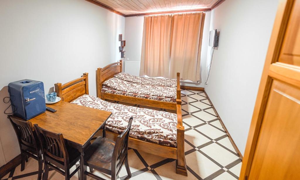 Postel nebo postele na pokoji v ubytování SAMARIANKA hotel