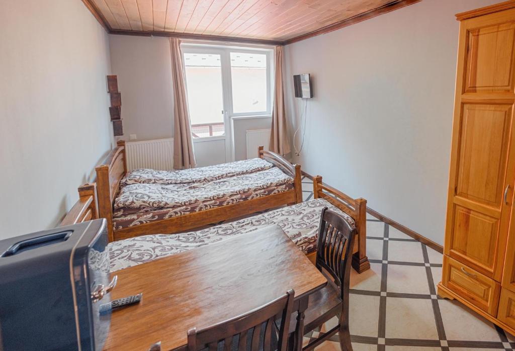 Postel nebo postele na pokoji v ubytování SAMARIANKA hotel