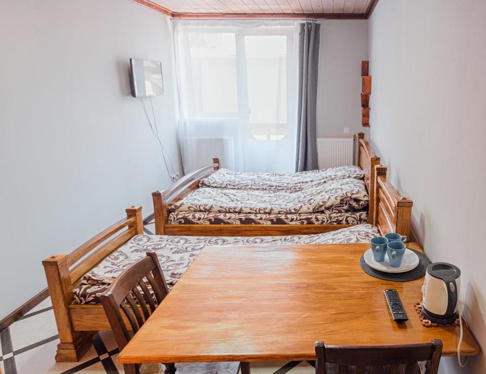 Postel nebo postele na pokoji v ubytování SAMARIANKA hotel