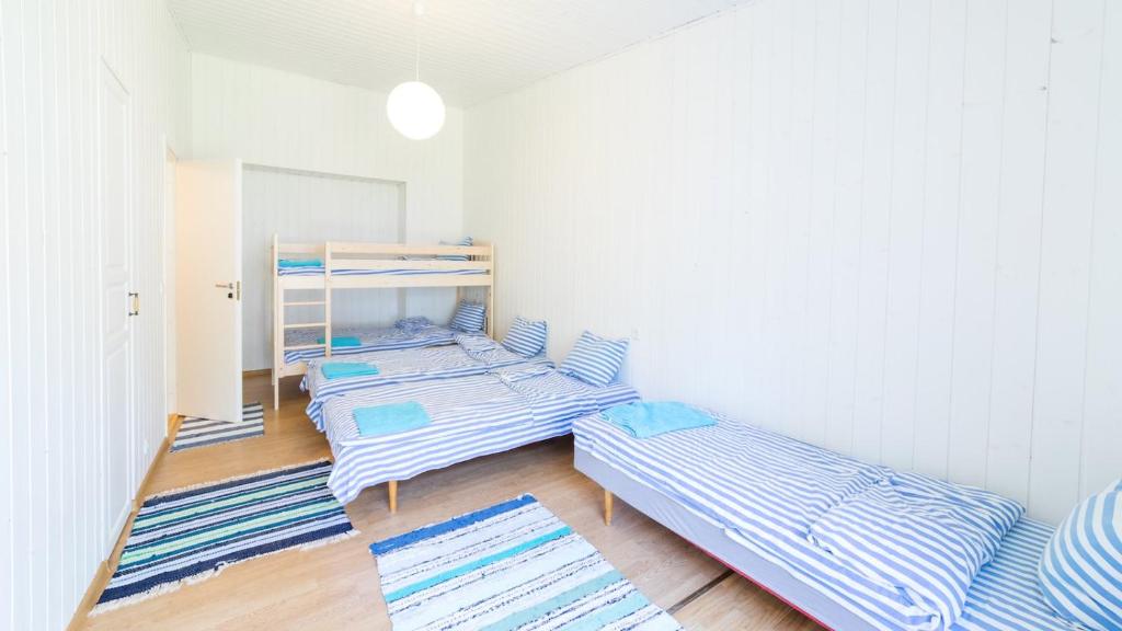 Postel nebo postele na pokoji v ubytování Puhkekeskus Valkla Rand- Simple accomodation