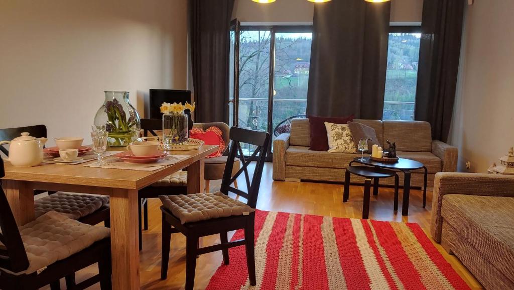 Posezení v ubytování Apartamenty Czerwone Maki Wisła