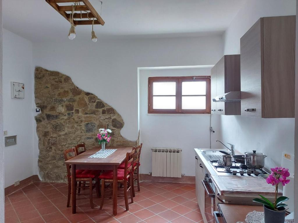 Kuchyň nebo kuchyňský kout v ubytování Agriturismo Capannacce