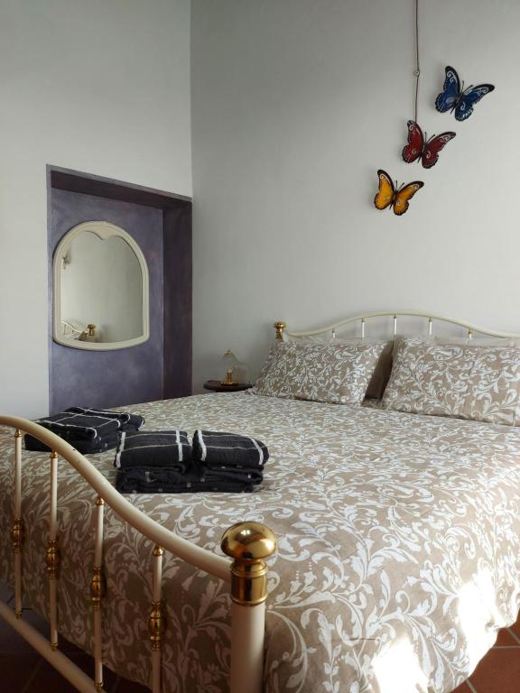 Postel nebo postele na pokoji v ubytování Agriturismo Capannacce