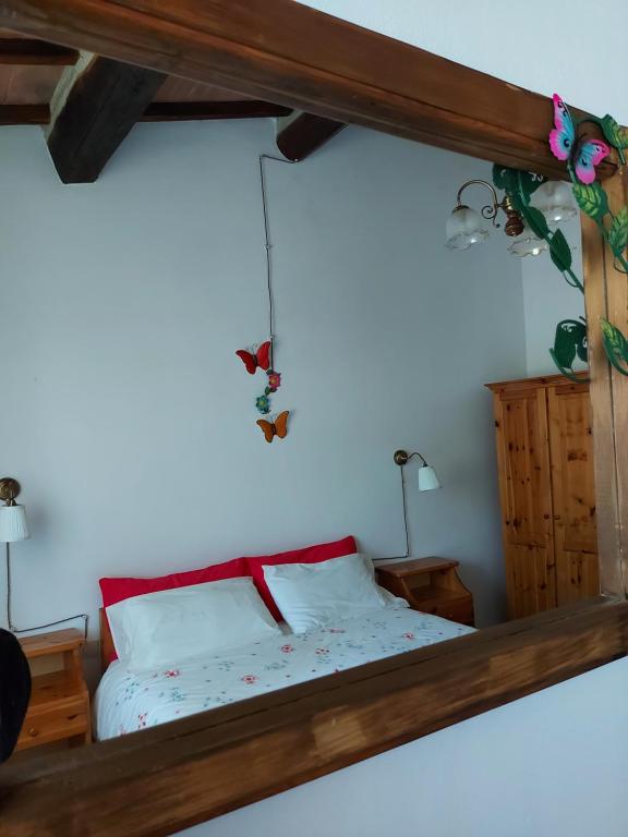 Postel nebo postele na pokoji v ubytování Agriturismo Capannacce