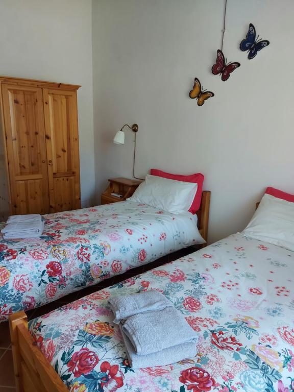 Postel nebo postele na pokoji v ubytování Agriturismo Capannacce