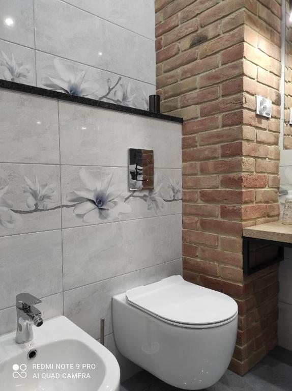 Kúpeľňa v ubytovaní MAZURSKA DAMA LUXURY APARTAMENT