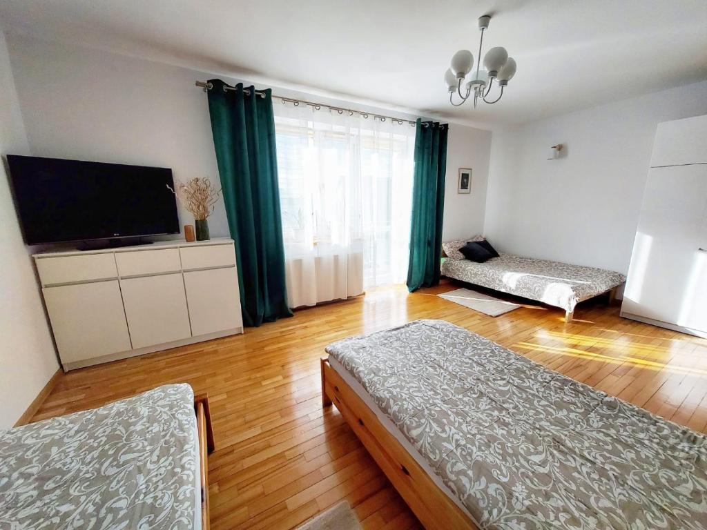 Postel nebo postele na pokoji v ubytování Dommieszkalny