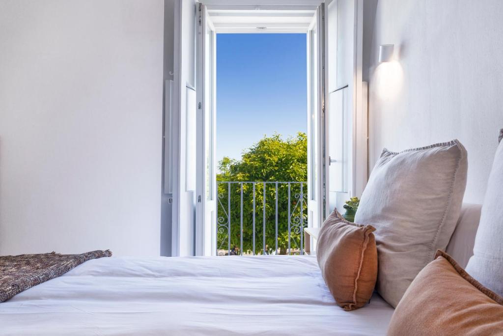 Postel nebo postele na pokoji v ubytování Casa Boutique Encalada