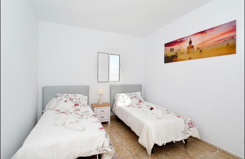 Postel nebo postele na pokoji v ubytování Casa Munsoo
