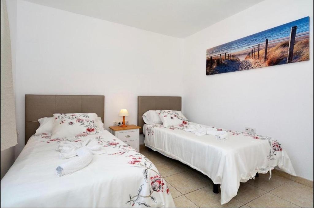 Postel nebo postele na pokoji v ubytování Casa Munsoo