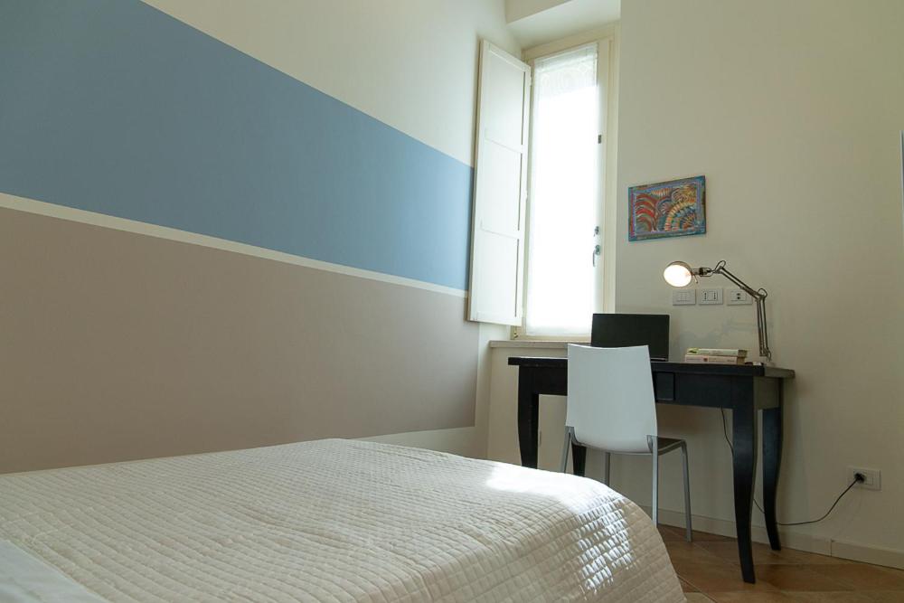 Posteľ alebo postele v izbe v ubytovaní Zara D'Amare a Pesaro 10 metri dalla spiaggia by Yohome