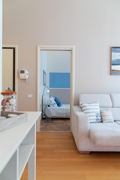 Posteľ alebo postele v izbe v ubytovaní Zara D'Amare a Pesaro 10 metri dalla spiaggia by Yohome
