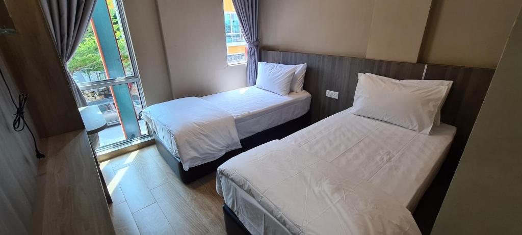 Letto o letti in una camera di Zitro Hotel