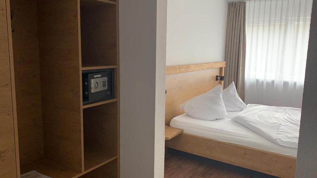 Postel nebo postele na pokoji v ubytování Forsthof