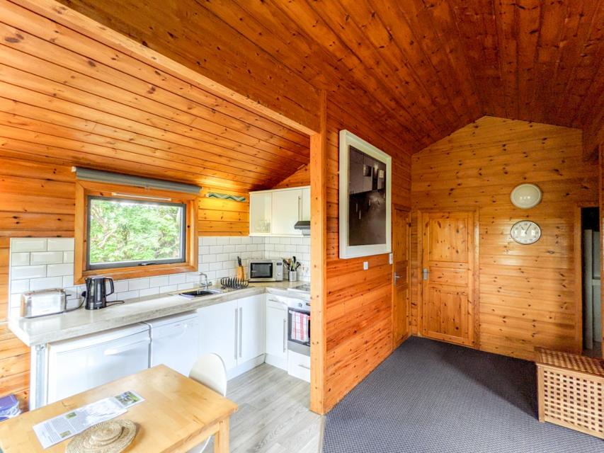 Kuchyň nebo kuchyňský kout v ubytování Avallon Lodges