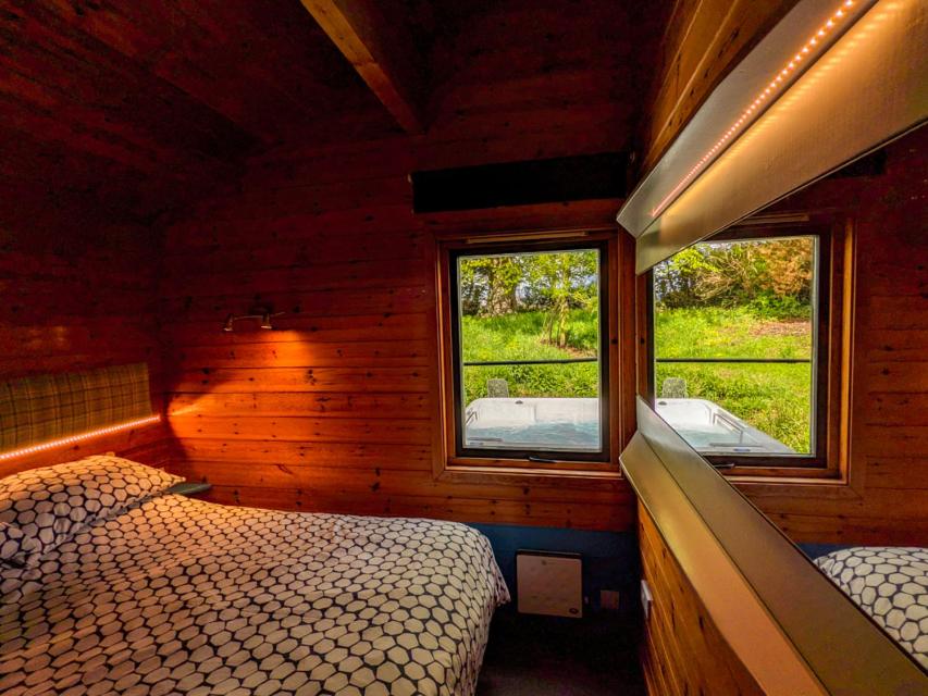 Postel nebo postele na pokoji v ubytování Avallon Lodges