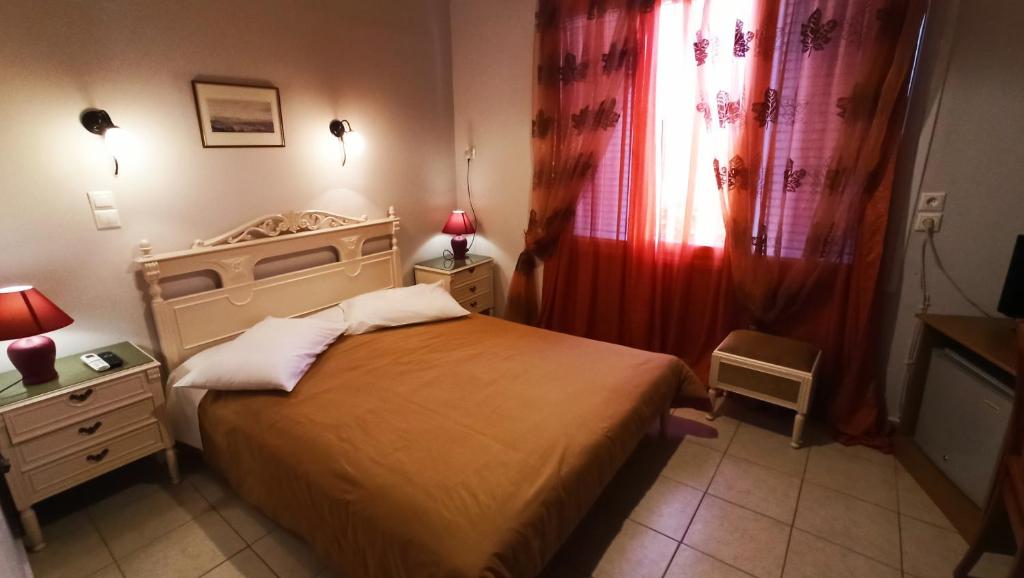 Postel nebo postele na pokoji v ubytování Hera Hotel