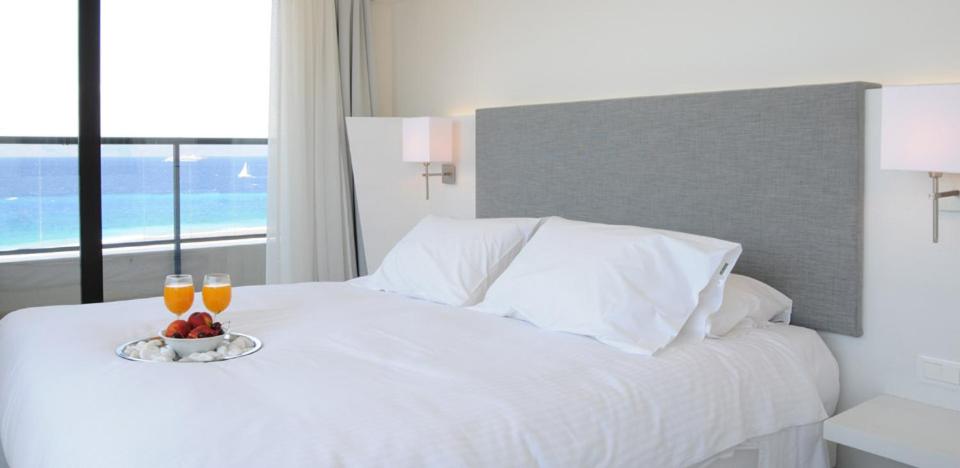 Posteľ alebo postele v izbe v ubytovaní Cactus Hotel