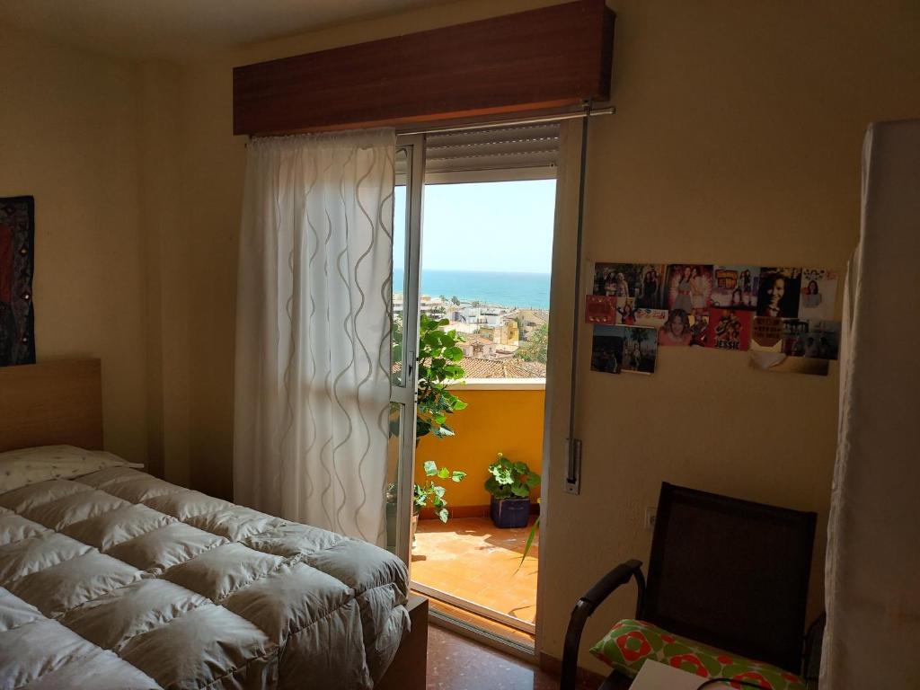 Posteľ alebo postele v izbe v ubytovaní Pedregalejo Room